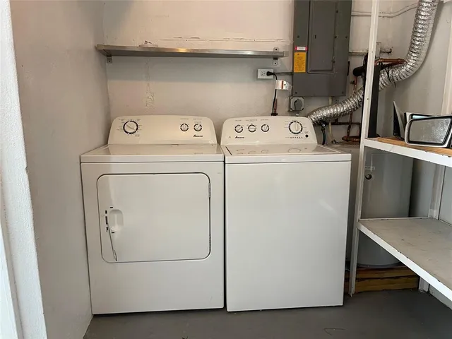 a utility room with dryer and washer