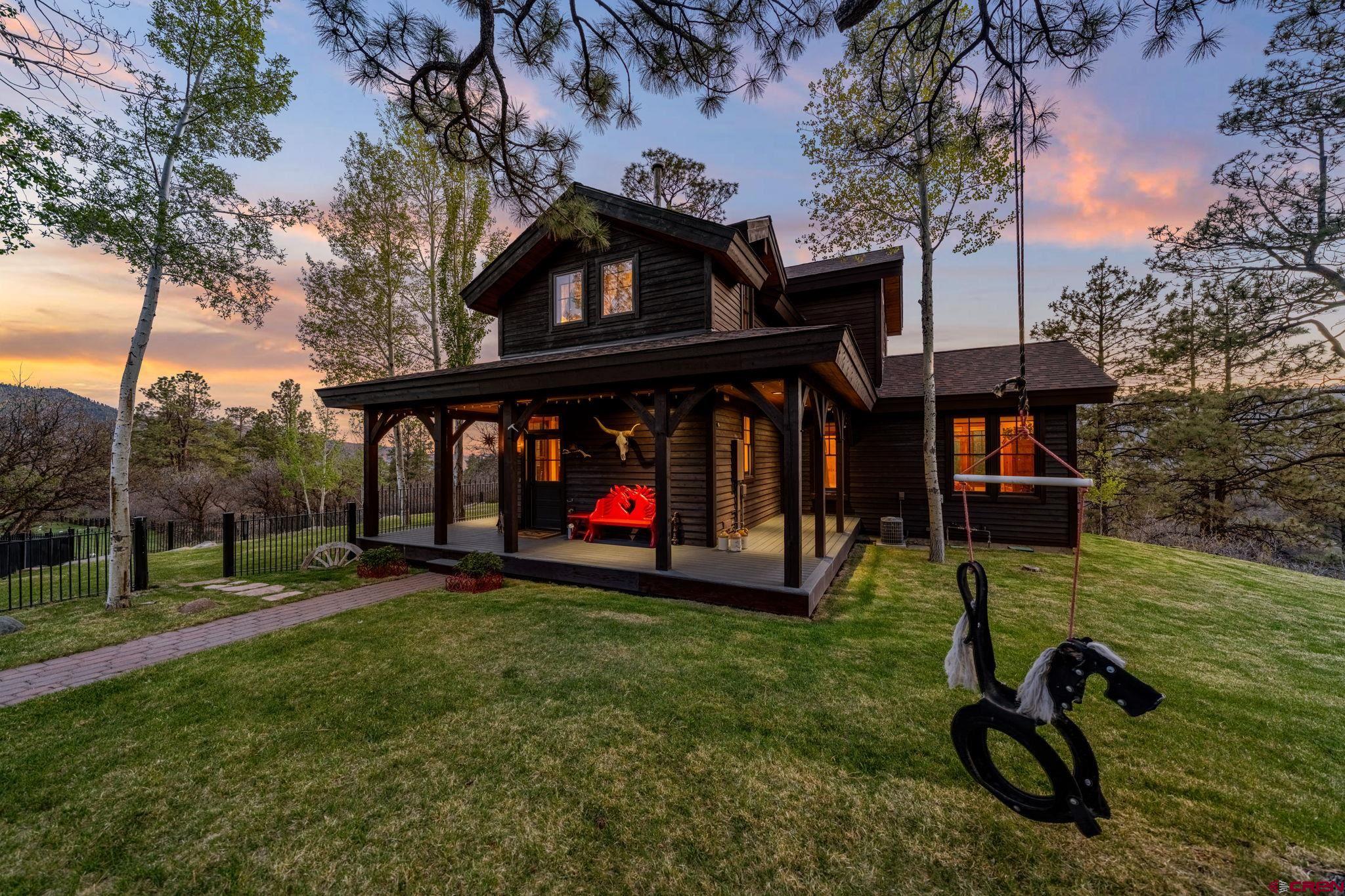 3623 Elkhorn Mountain Road Durango, CO 81301 - Photo 1 of 44 a view of a backyard with a patio
