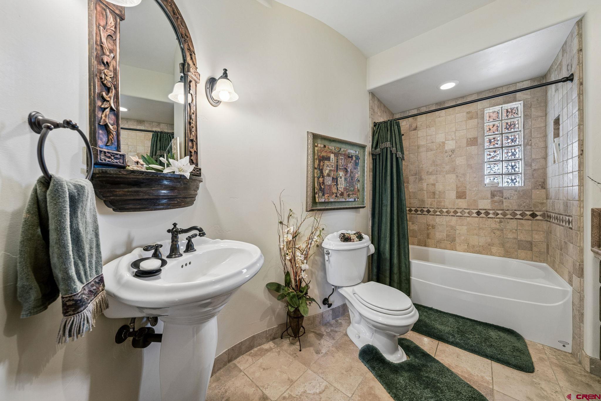 3623 Elkhorn Mountain Road Durango, CO 81301 - Photo 23 of 44 a bathroom with a sink toilet and shower