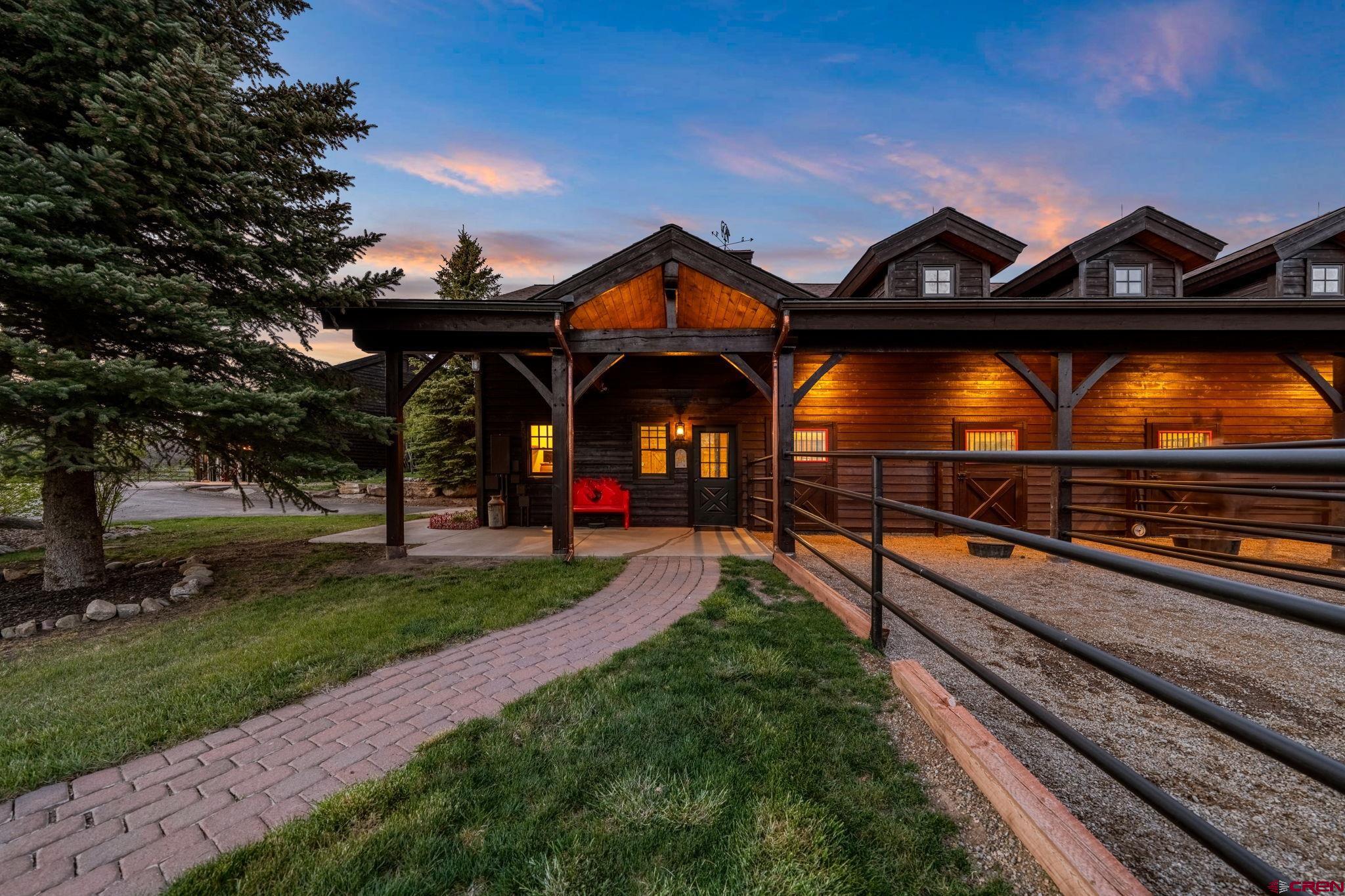 3623 Elkhorn Mountain Road Durango, CO 81301 - Photo 24 of 44 a view of a car park in front of a house with a yard