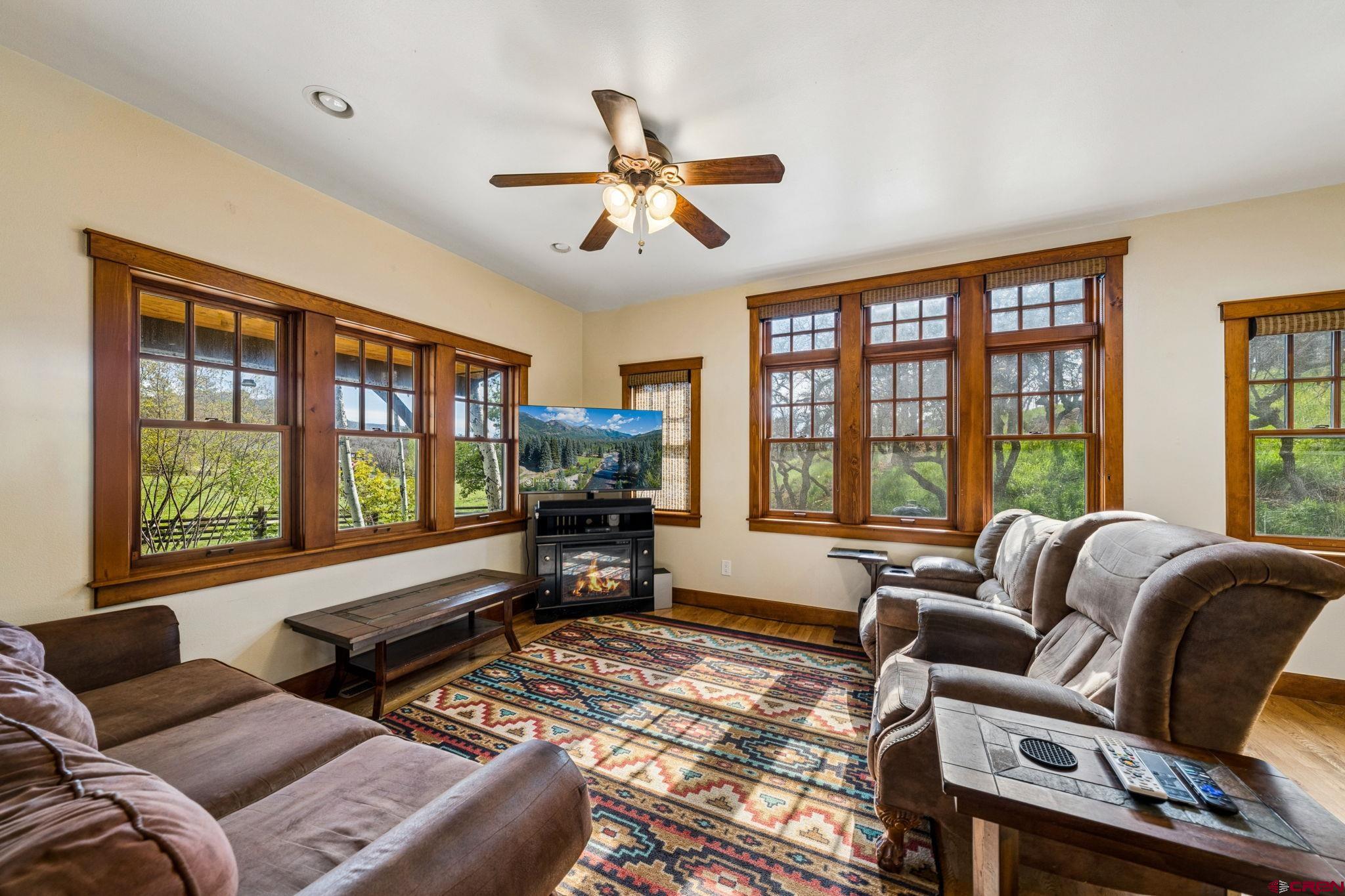 3623 Elkhorn Mountain Road Durango, CO 81301 - Photo 31 of 44 a living room with furniture and a large window