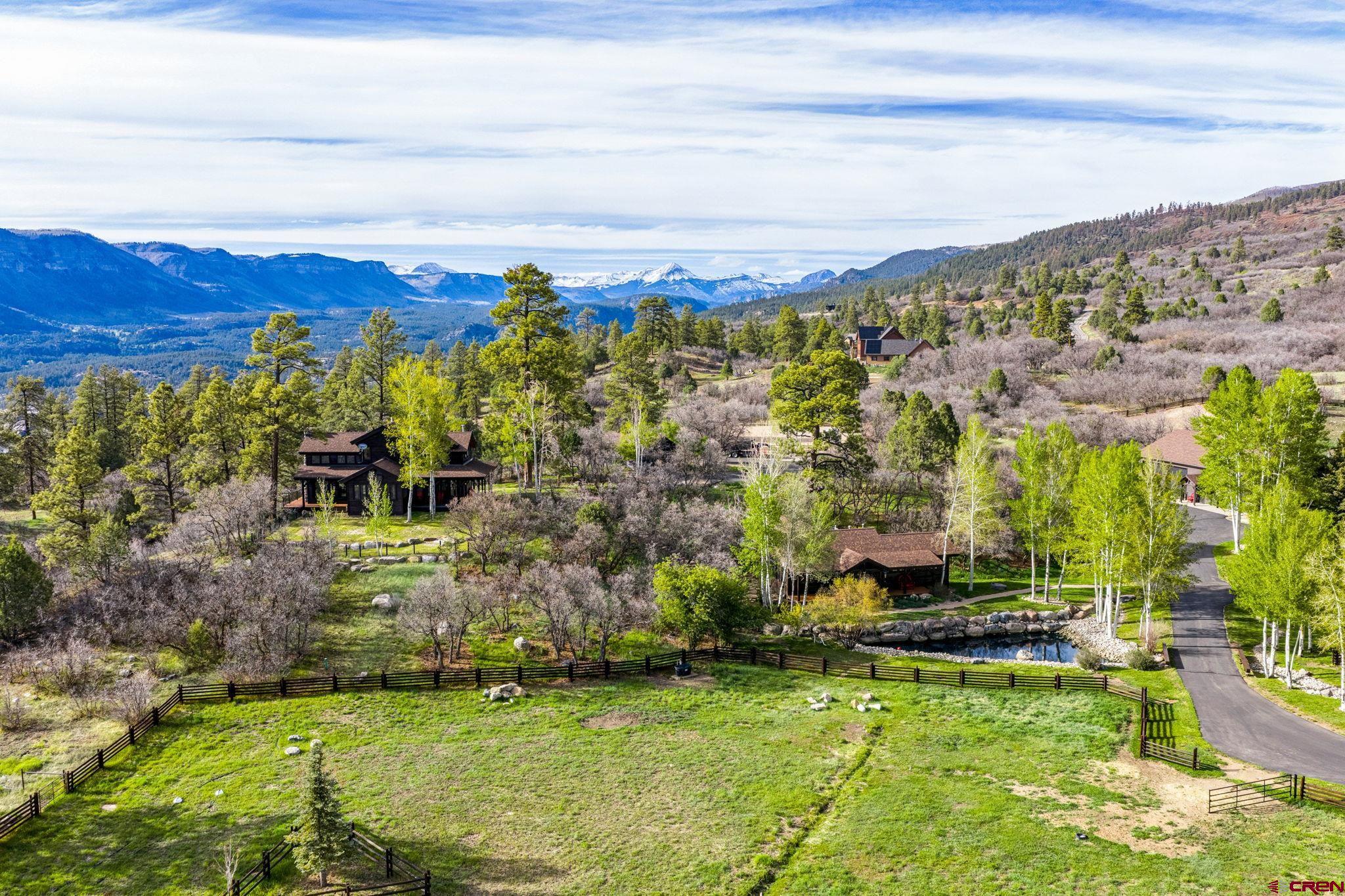 3623 Elkhorn Mountain Road Durango, CO 81301 - Photo 40 of 44 a view of a garden with a building in the background