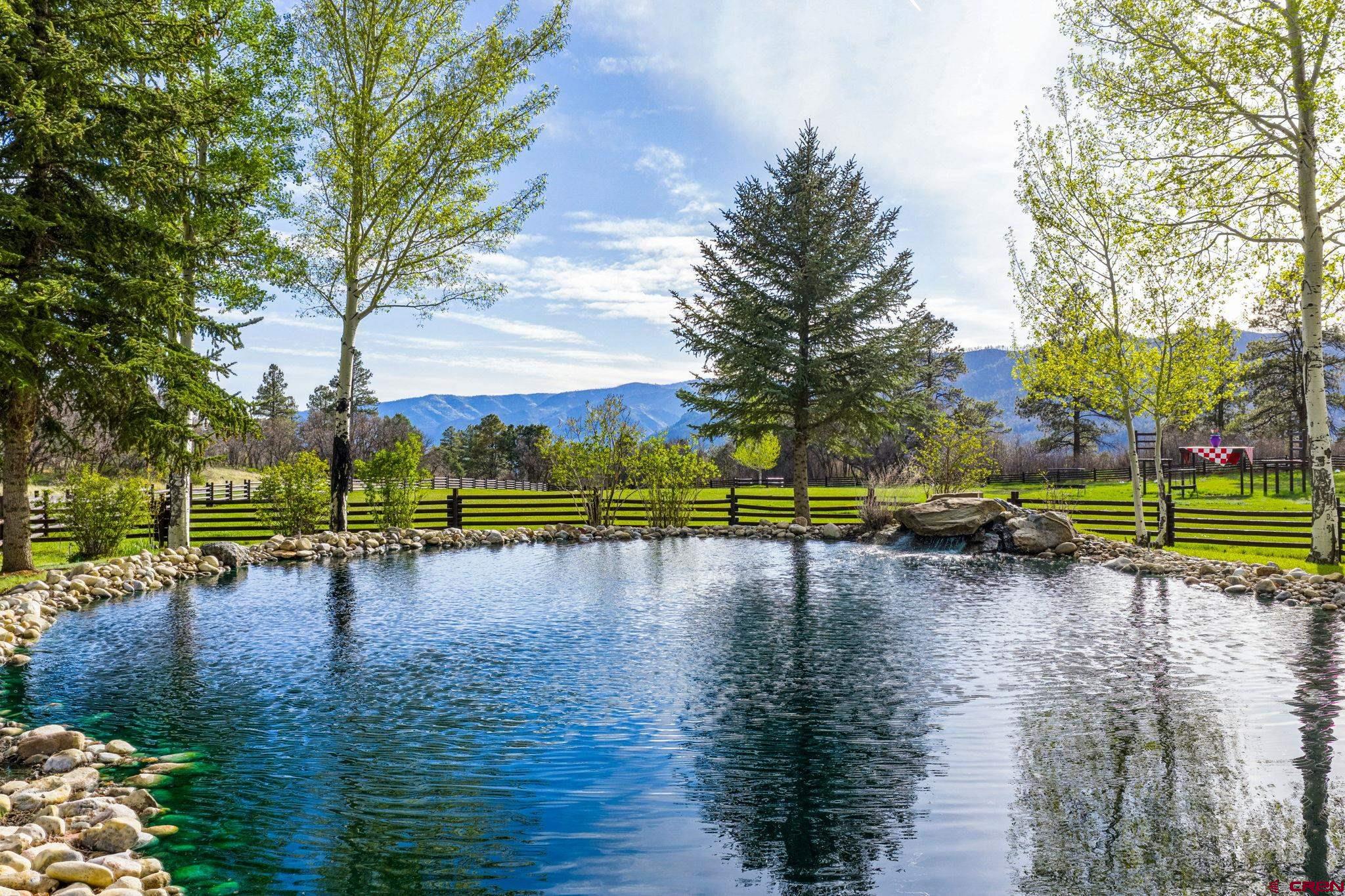 3623 Elkhorn Mountain Road Durango, CO 81301 - Photo 41 of 44 a view of a lake with houses