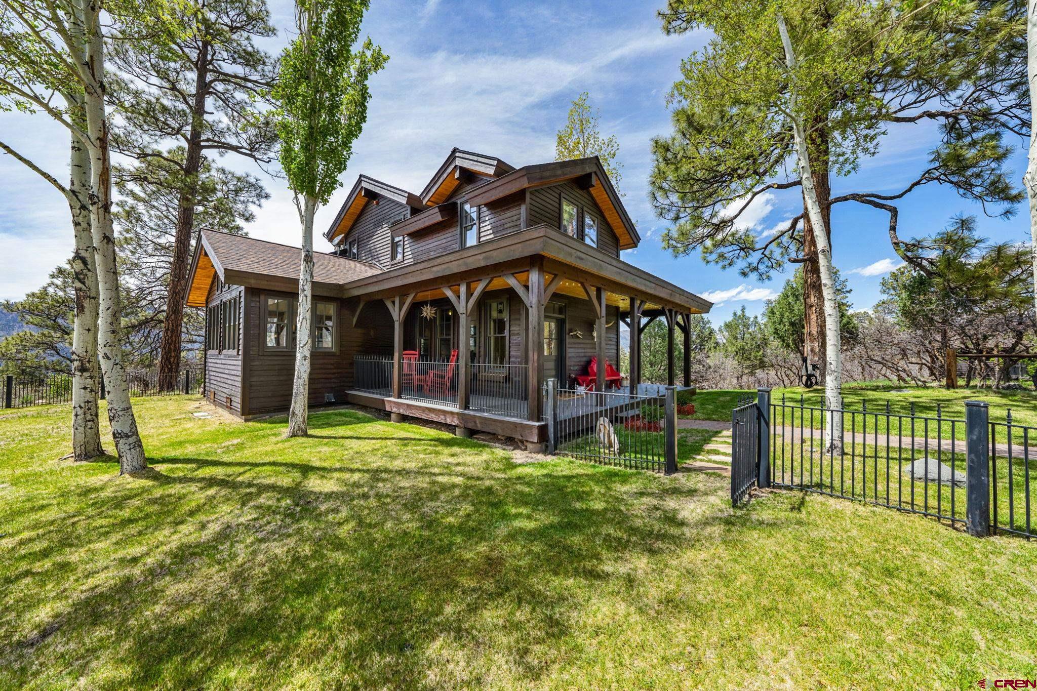 3623 Elkhorn Mountain Road Durango, CO 81301 - Photo 7 of 44 a view of a house with a yard porch and sitting area