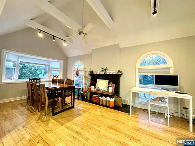 a view of a workspace with furniture