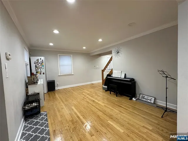 a bedroom with a bed and a view of bathroom