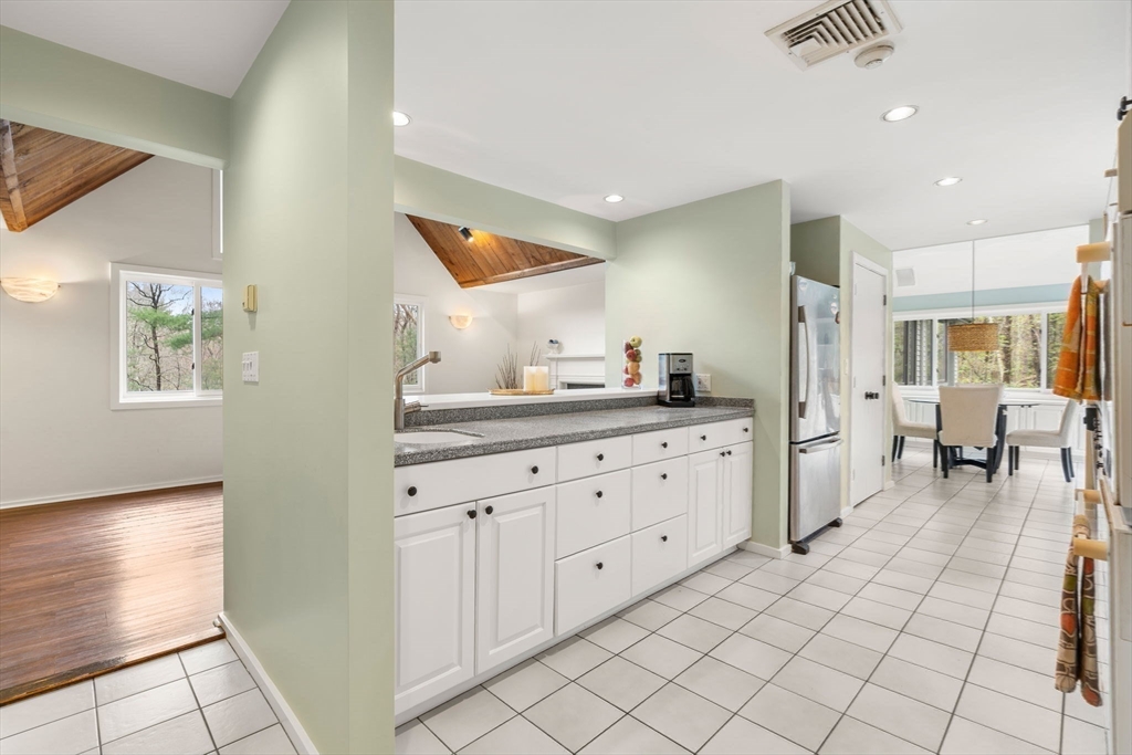 7 Northedge Road Hamilton, MA 01982 - Photo 11 of 42 a spacious bathroom with a double vanity sink and a mirror