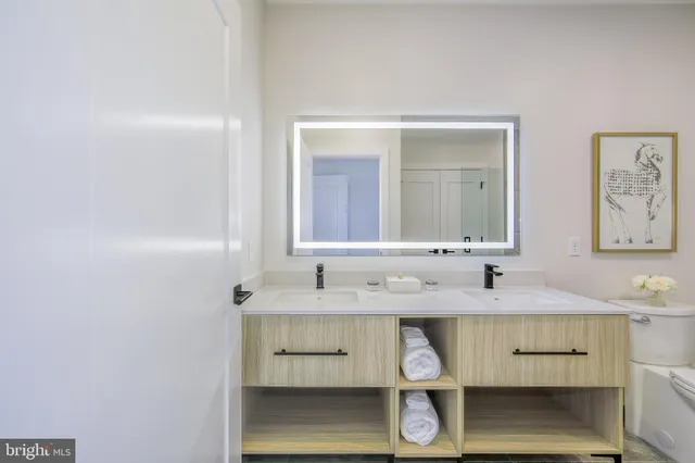 a bathroom with a shower and toilet