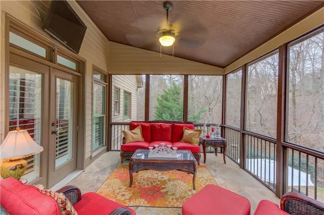 a backyard of a house with a garden and plants