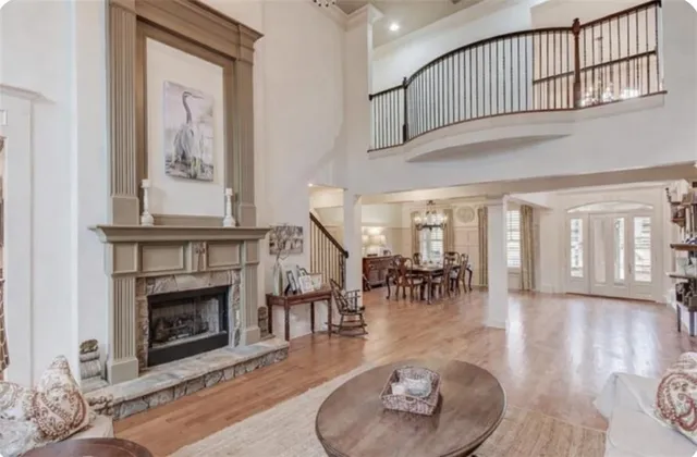 a kitchen with kitchen island a stove cabinets and wooden floor