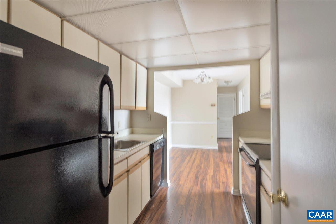 130 Turtle Creek Road, Unit 6 Charlottesville, VA 22901 - Photo 3 of 15 a view of a hallway with wooden floor