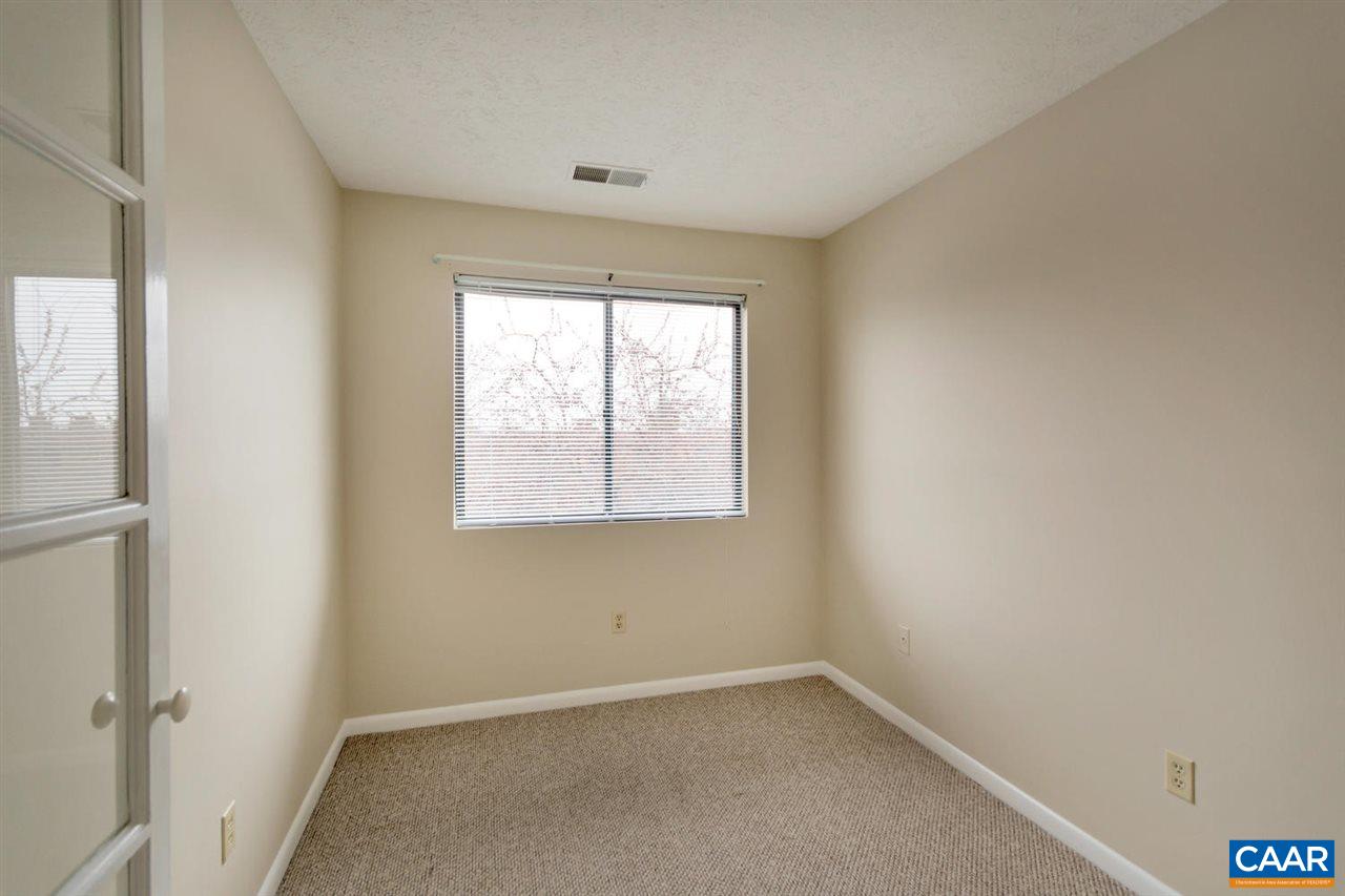 130 Turtle Creek Road, Unit 6 Charlottesville, VA 22901 - Photo 5 of 15 an empty room with a window