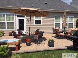 2 Pebble Creek Road Dayton, NJ 08810 - Photo 19 of 22 a view of a patio with couches chairs and potted plants