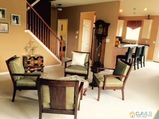 2 Pebble Creek Road Dayton, NJ 08810 - Photo 5 of 22 a view of entryway and hall with wooden floor