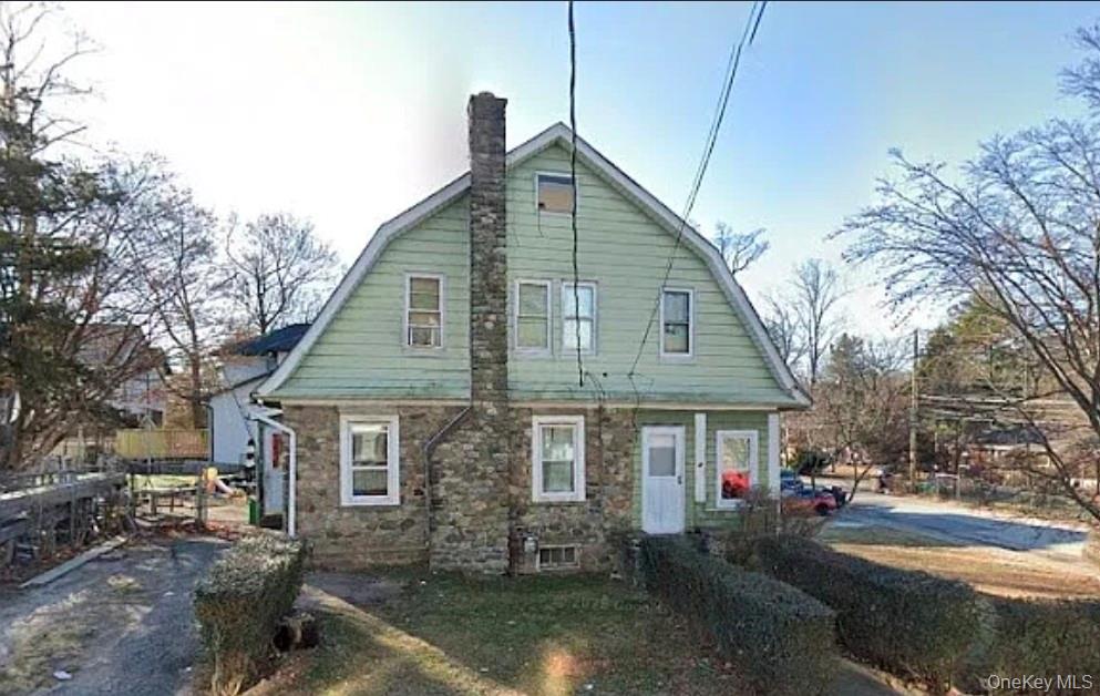 2 Singer Avenue Spring Valley, NY 10977 - Photo 1 of 1 a front view of a house with a yard