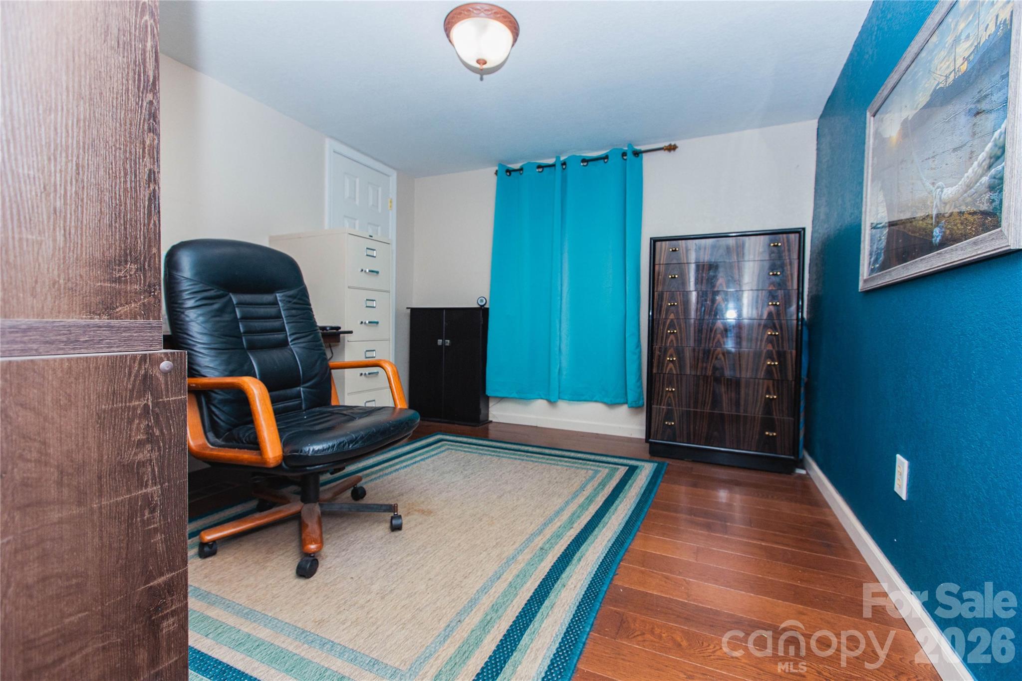 839 Hidden View Loop Marion, NC 28752 - Photo 15 of 32 a room with furniture and gym equipment