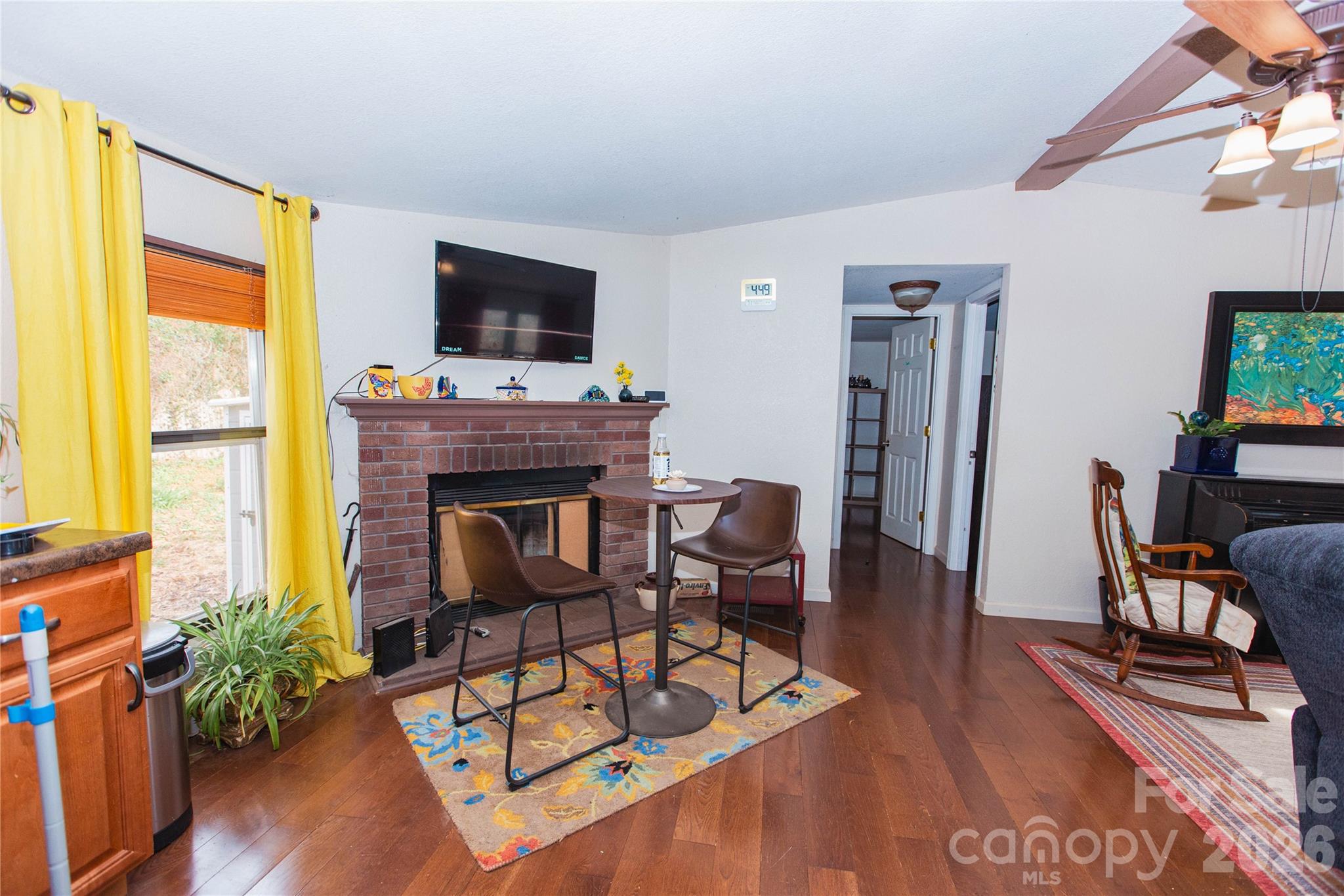 839 Hidden View Loop Marion, NC 28752 - Photo 19 of 32 a living room with furniture fireplace and flat screen tv