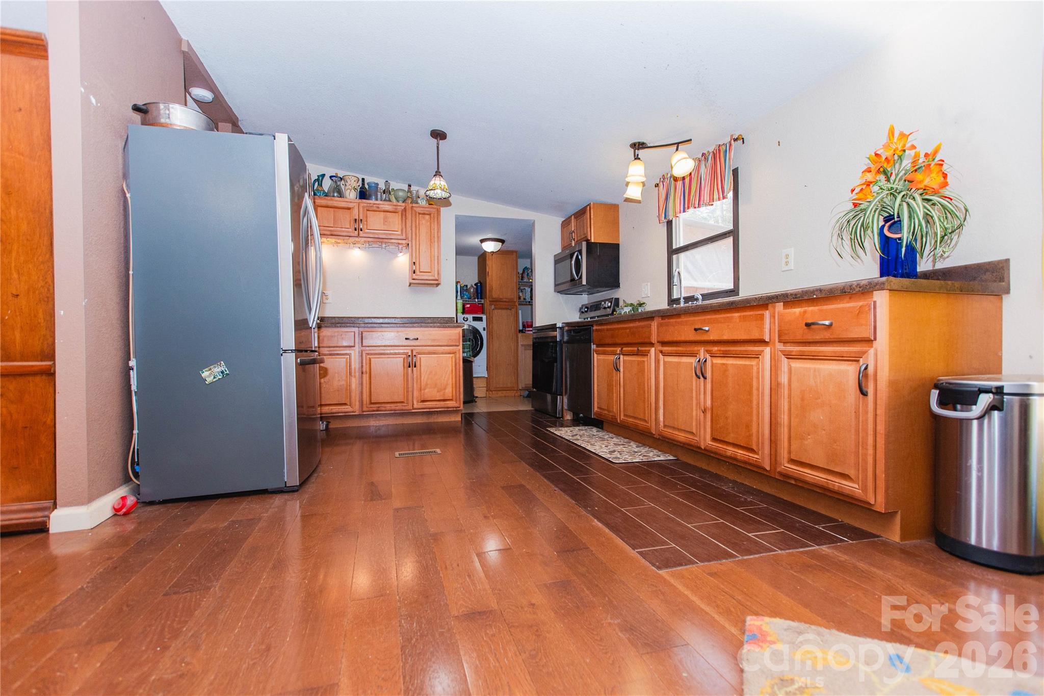 839 Hidden View Loop Marion, NC 28752 - Photo 24 of 32 a kitchen with stainless steel appliances a refrigerator and a stove