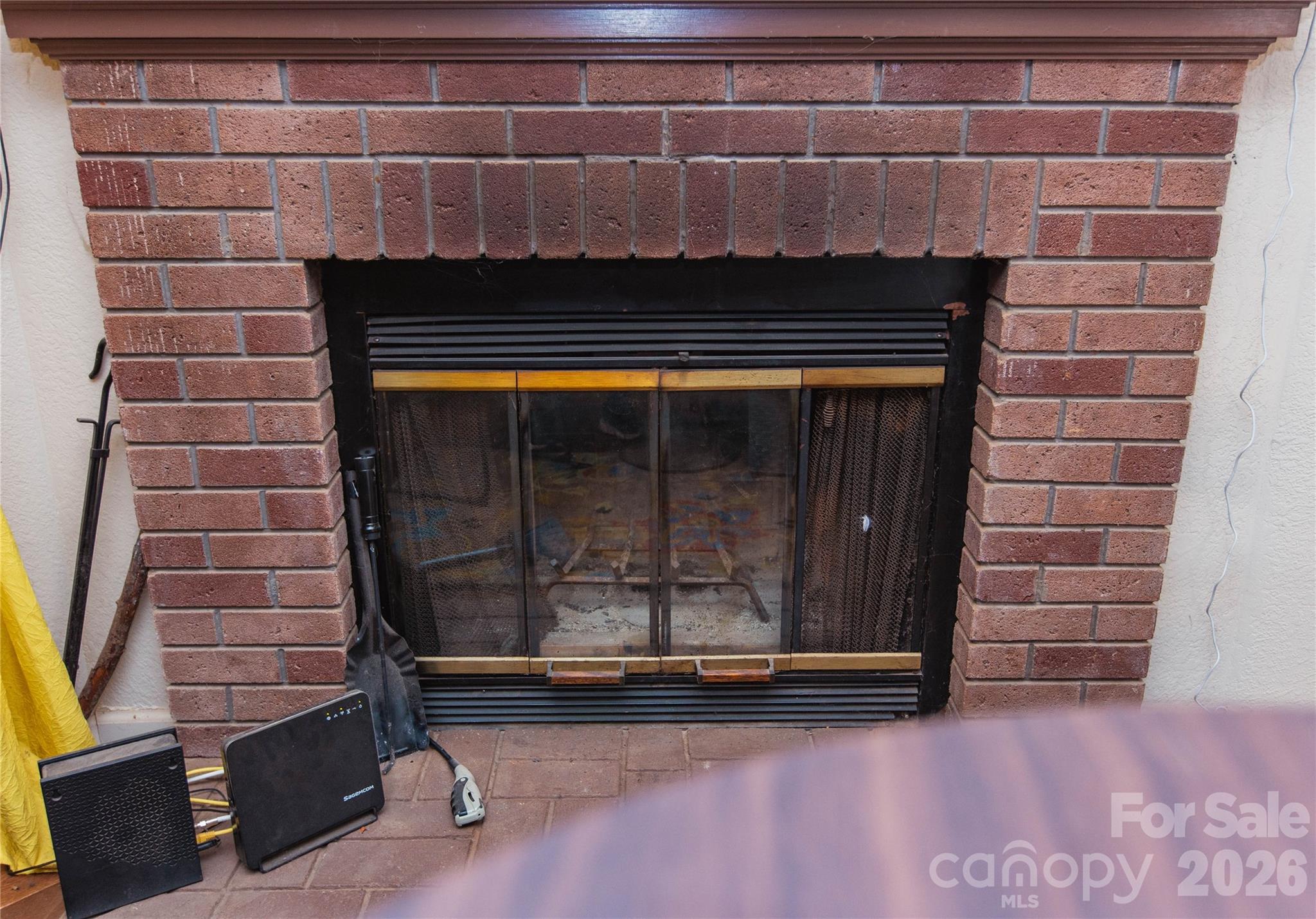 839 Hidden View Loop Marion, NC 28752 - Photo 25 of 32 a view of fireplace and wooden floor