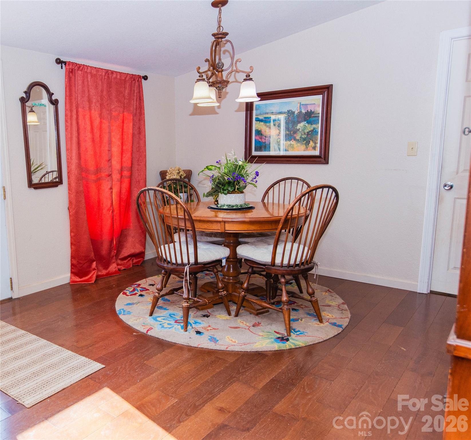 839 Hidden View Loop Marion, NC 28752 - Photo 26 of 32 a view of a dining room with furniture window and wooden floor