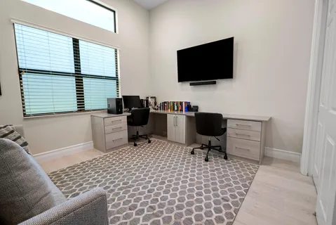 a view of a house with backyard porch and patio