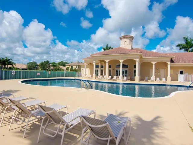 a front view of a house with swimming pool