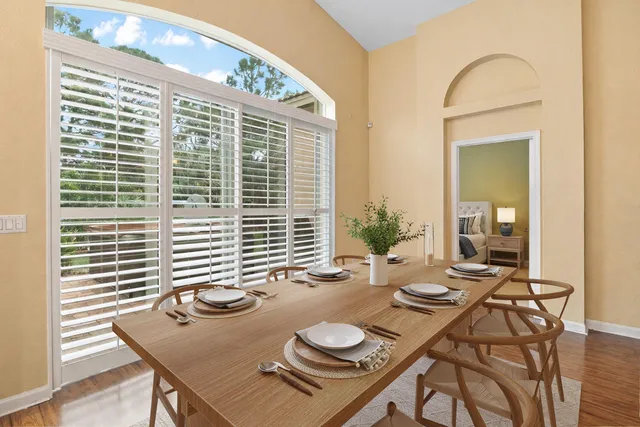 a view of a dining room and livingroom with furniture