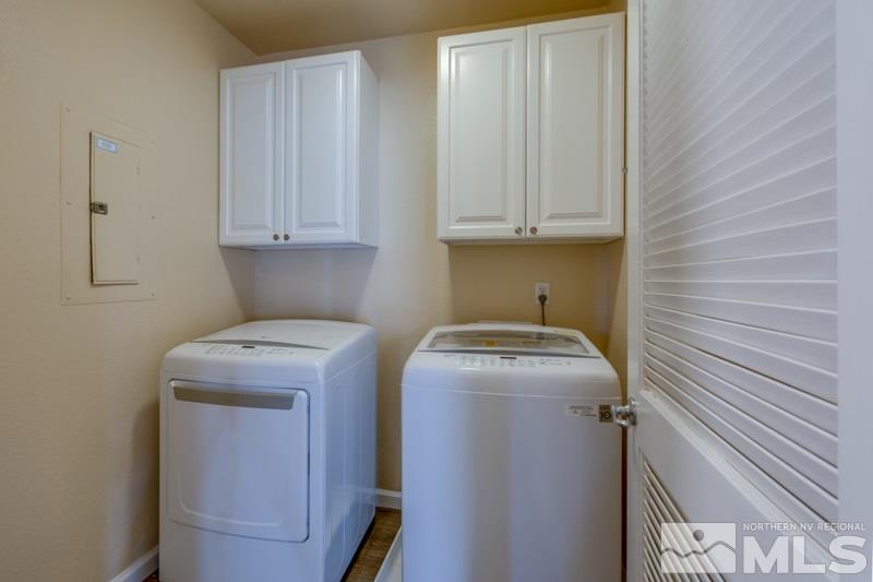 9050 Double R Boulevard, Unit 724 Reno, NV 89511 - Photo 12 of 18 a utility room with dryer and washer