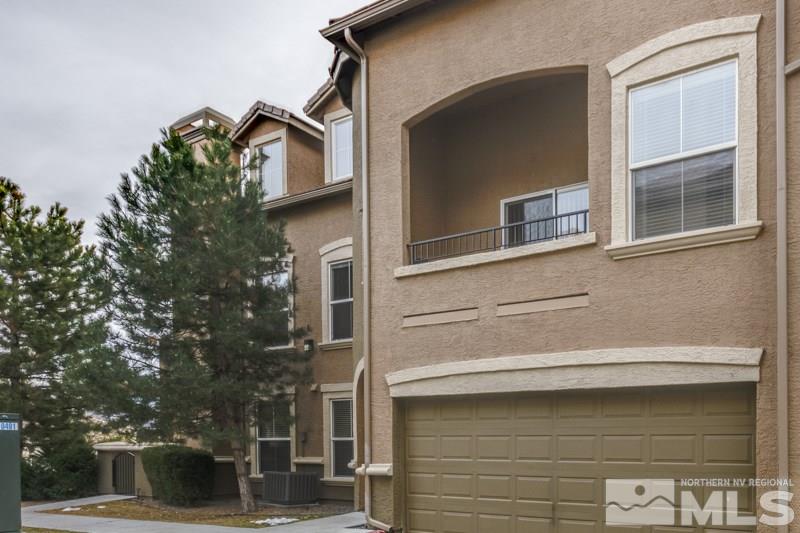 9050 Double R Boulevard, Unit 724 Reno, NV 89511 - Photo 16 of 18 a front view of a building with a street