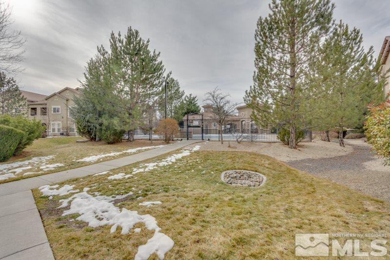 9050 Double R Boulevard, Unit 724 Reno, NV 89511 - Photo 18 of 18 a view of yard with swimming pool