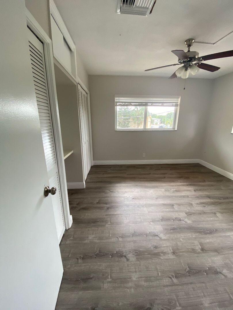 480 West Camino Real, Unit 31 Boca Raton, FL 33432 - Photo 9 of 22 an empty room with windows