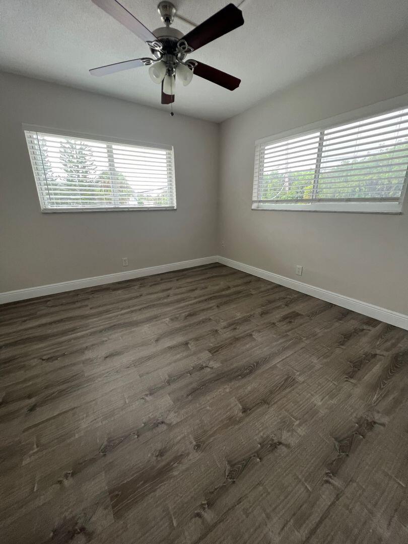 480 West Camino Real, Unit 31 Boca Raton, FL 33432 - Photo 10 of 22 a view of an empty room and window