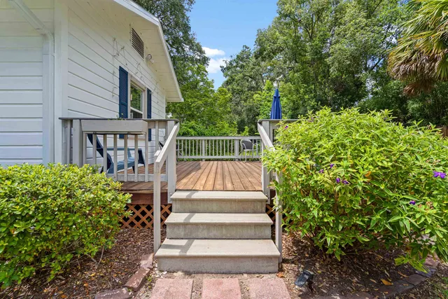 a view of stairs with garden