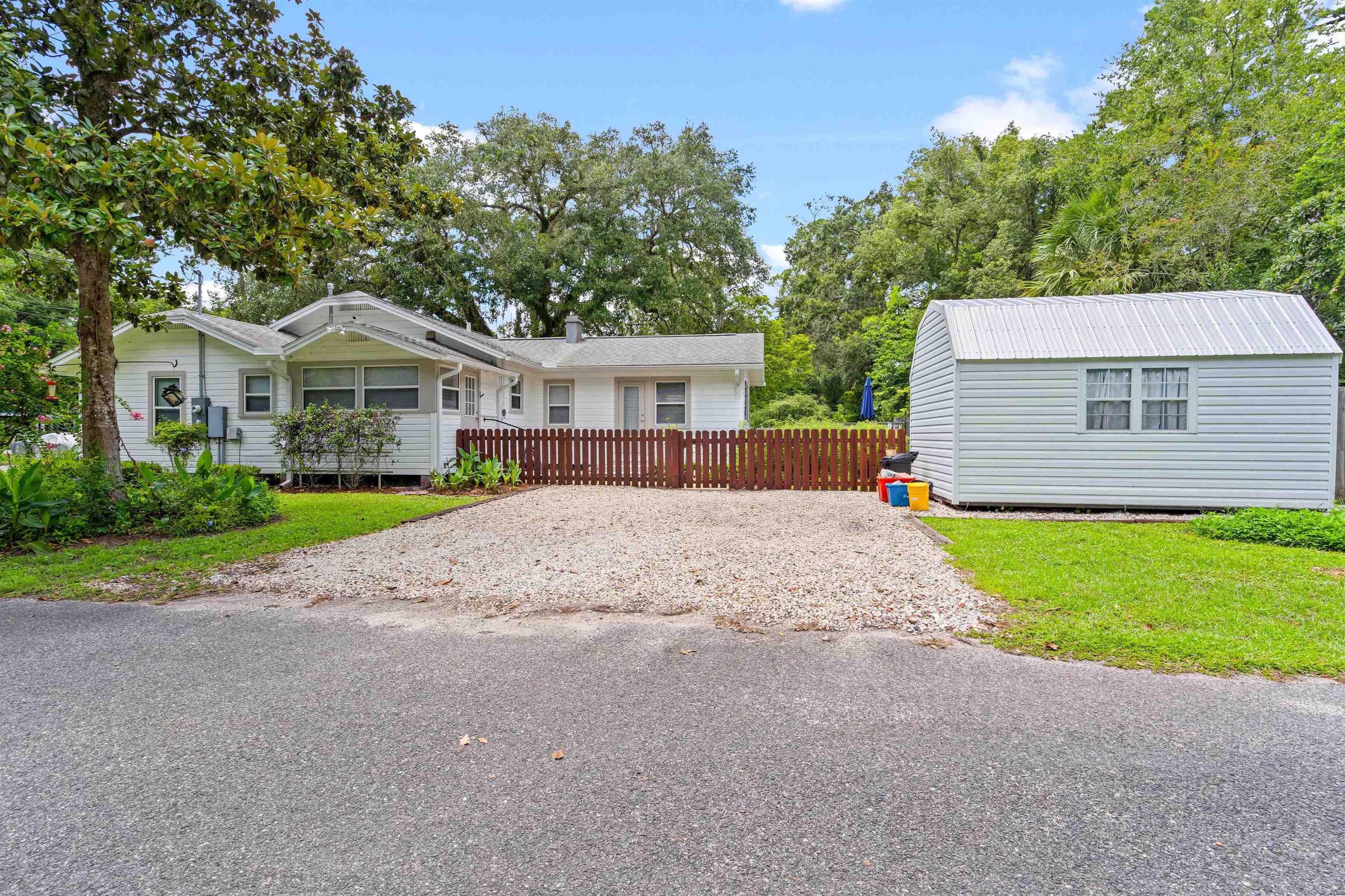 716 Northeast 10th Avenue Gainesville, FL 32601 - Photo 29 of 29 a view of outdoor space yard and front view of a house