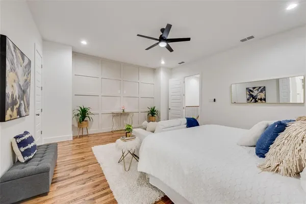 a bed room with a bed and a couch