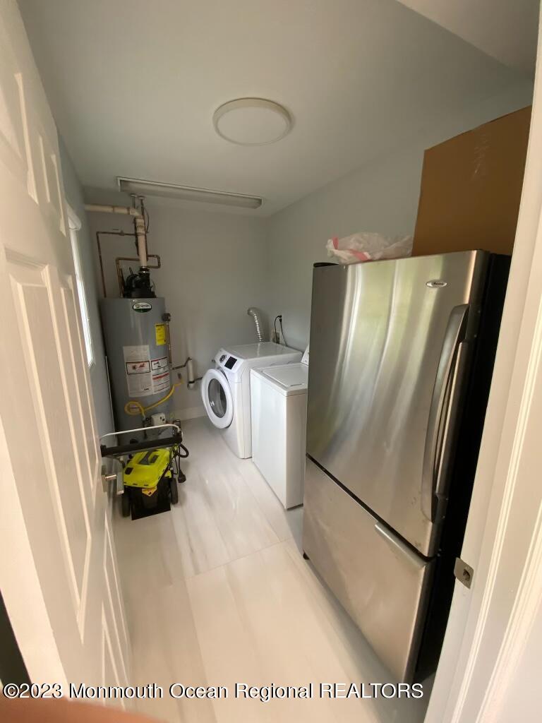 258 Norgrove Avenue Long Branch, NJ 07740 - Photo 10 of 16 a kitchen with a refrigerator and a stove
