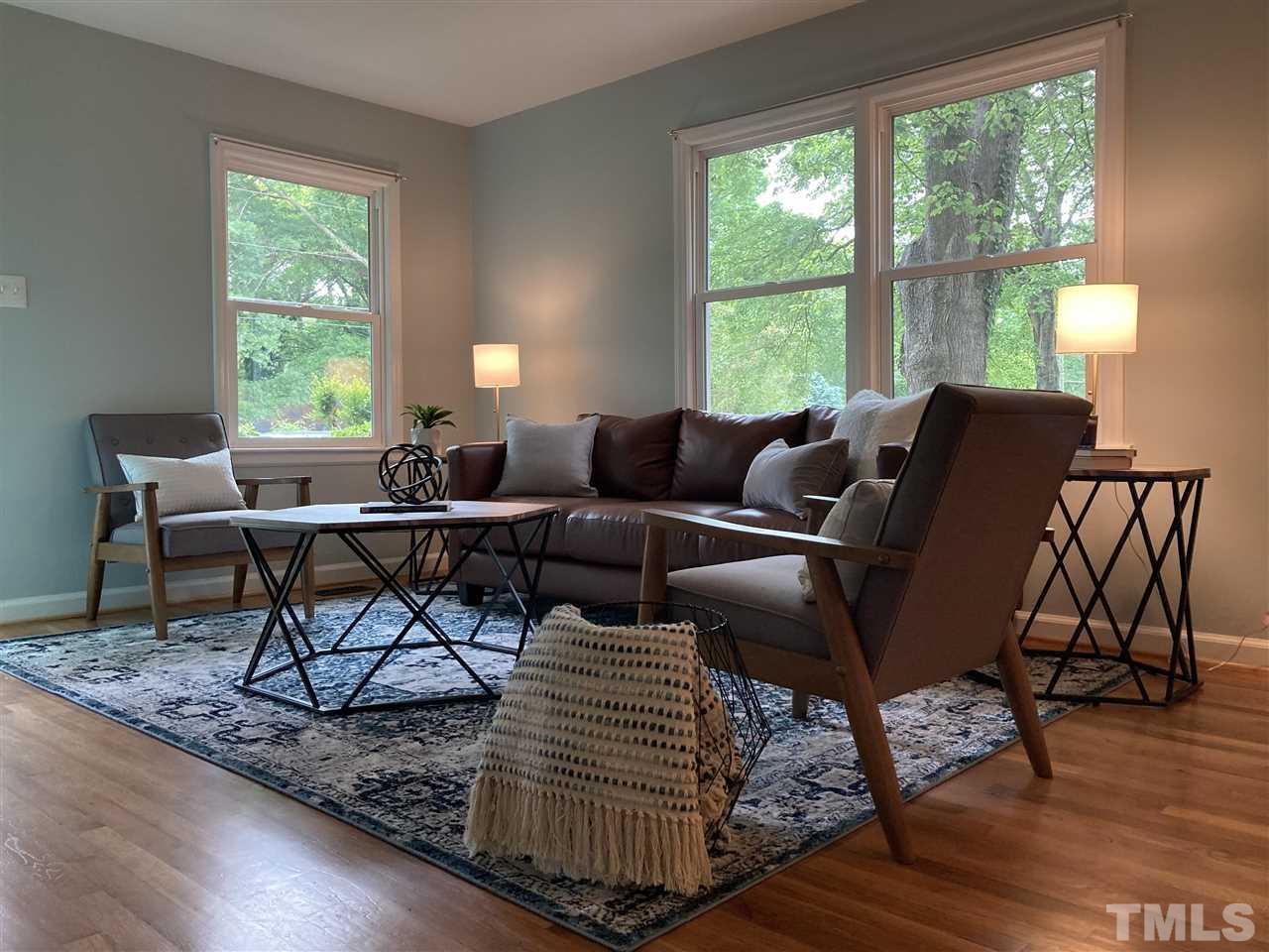 2433 Stevens Road Raleigh, NC 27610 - Photo 3 of 15 a living room with furniture and a large window