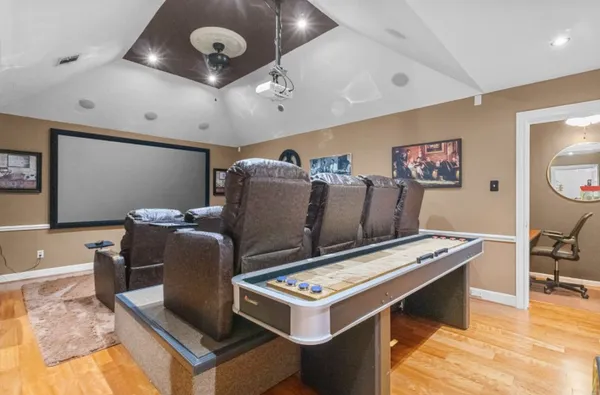 a view of a house with basketball court