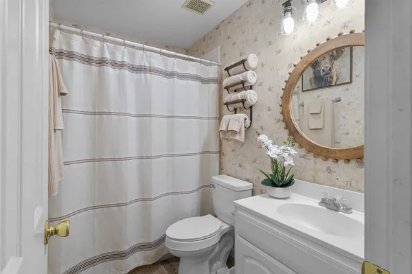 a swimming pool with outdoor seating yard and barbeque oven