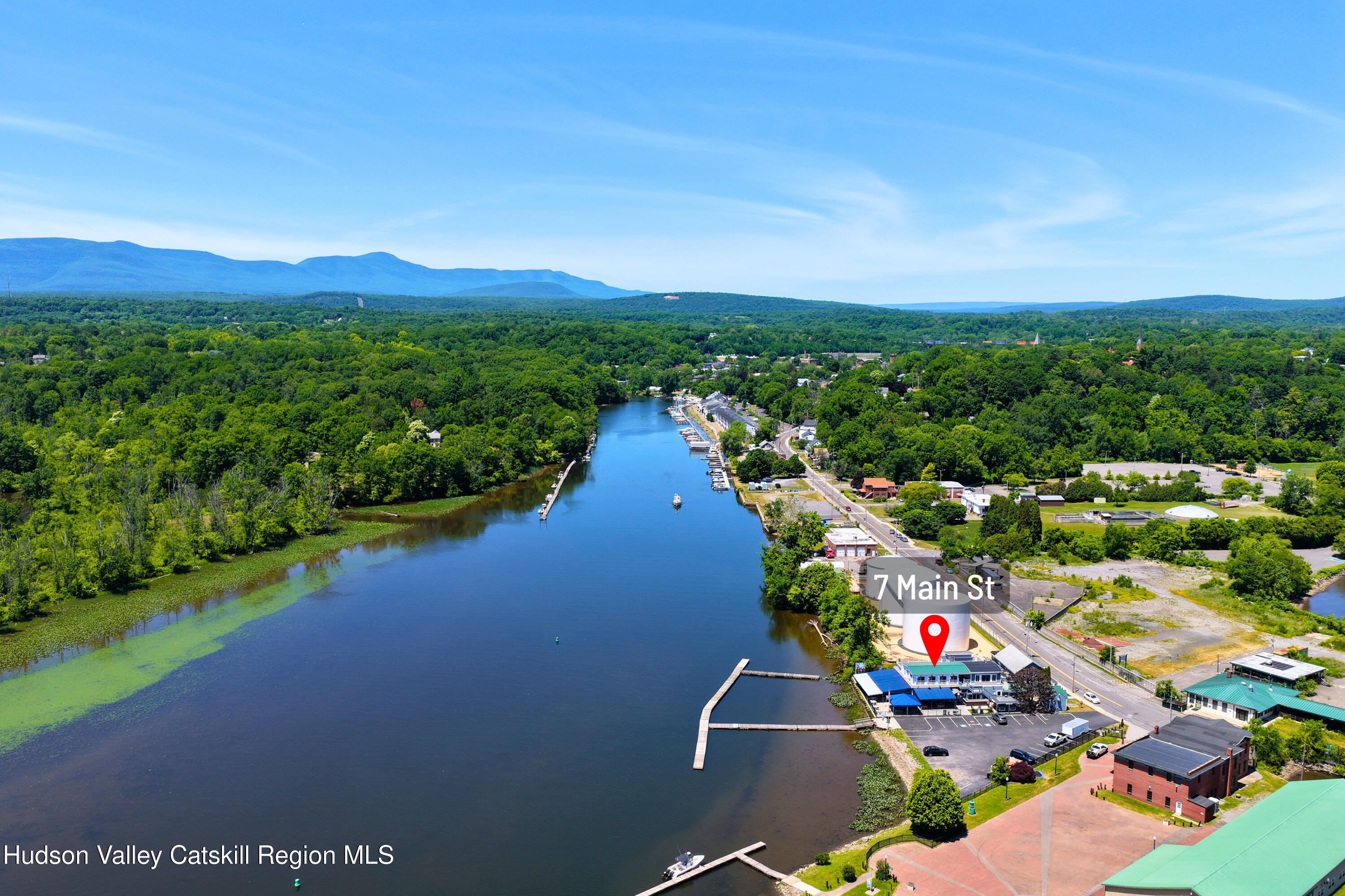 7 Main Street Catskill, NY 12414 - Photo 40 of 40 a view of a lake with a mountain in the background