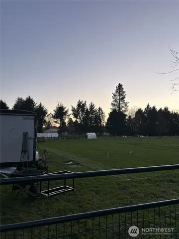 a view of a bench in a yard