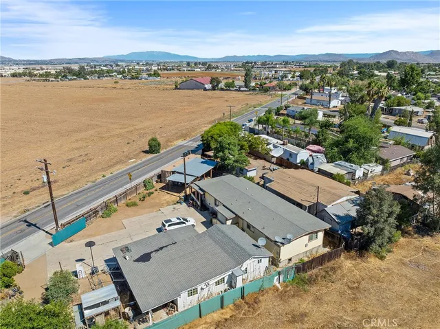 an aerial view of a house with a ocean view