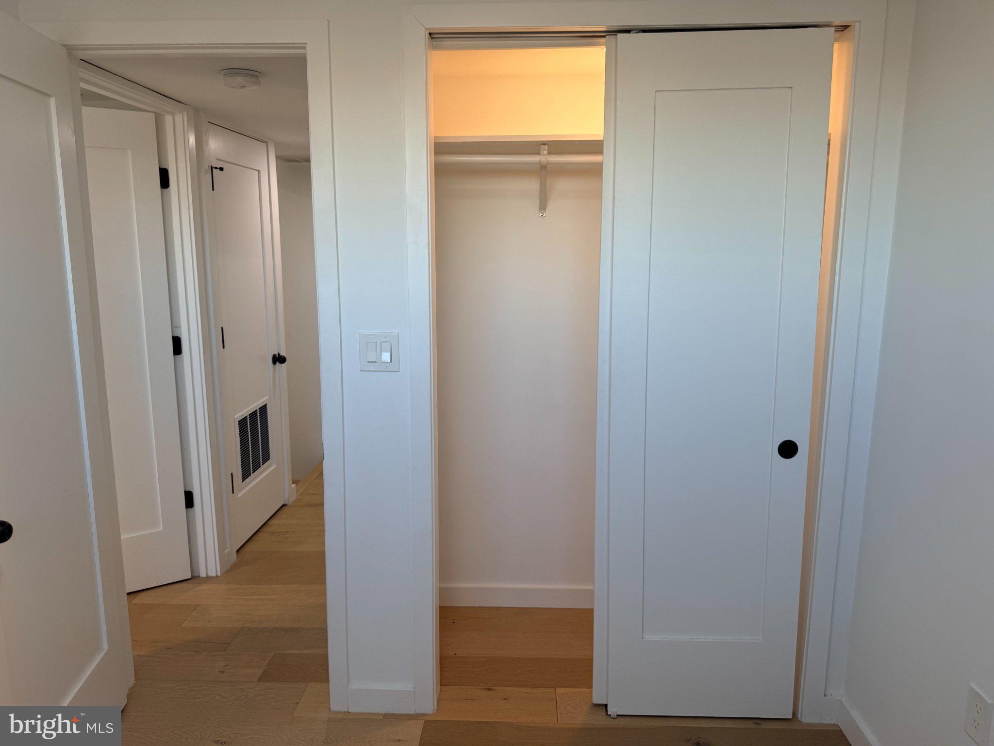 3601 14th Street Northwest, Unit 9 Washington, DC 20010 - Photo 12 of 34 Bright, modern hallway with closet access.