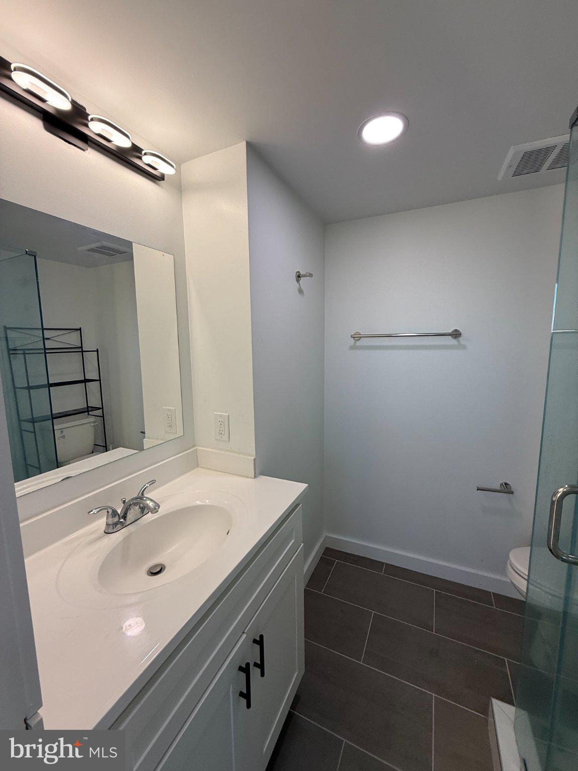 3601 14th Street Northwest, Unit 9 Washington, DC 20010 - Photo 18 of 34 Modern bathroom with sleek finishes.