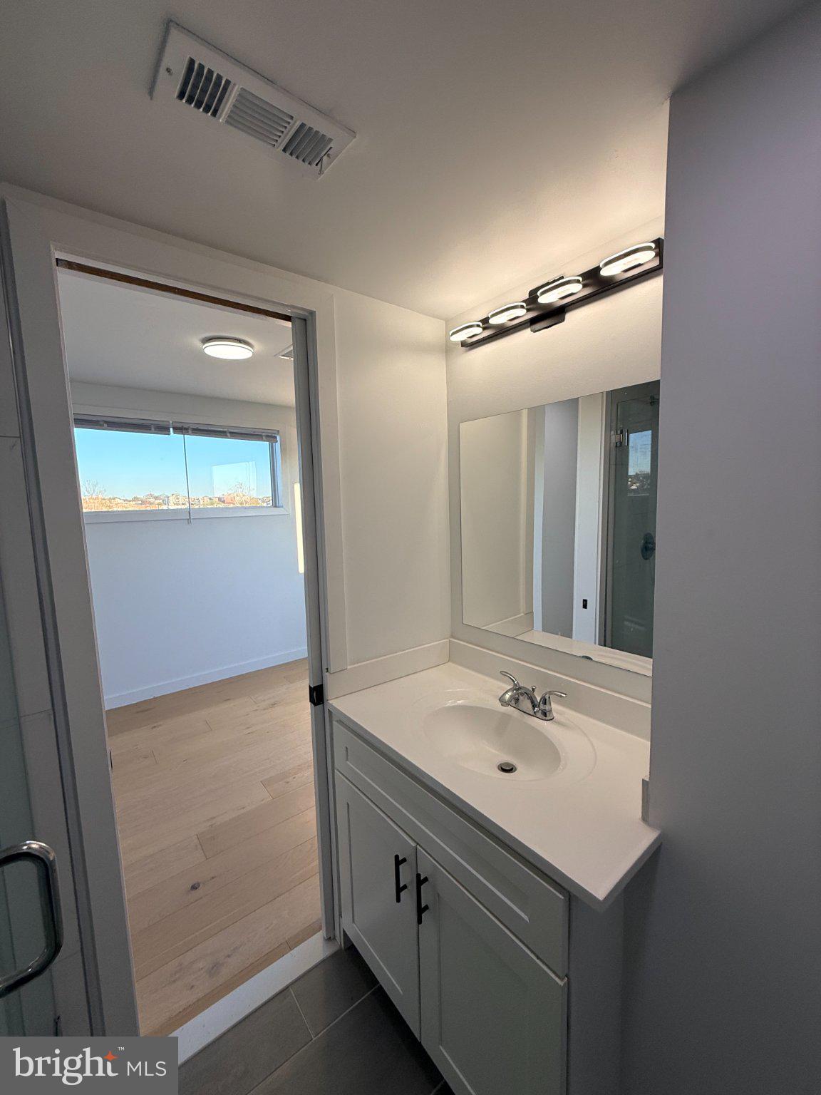 3601 14th Street Northwest, Unit 9 Washington, DC 20010 - Photo 21 of 34 Bright and modern bathroom oasis.