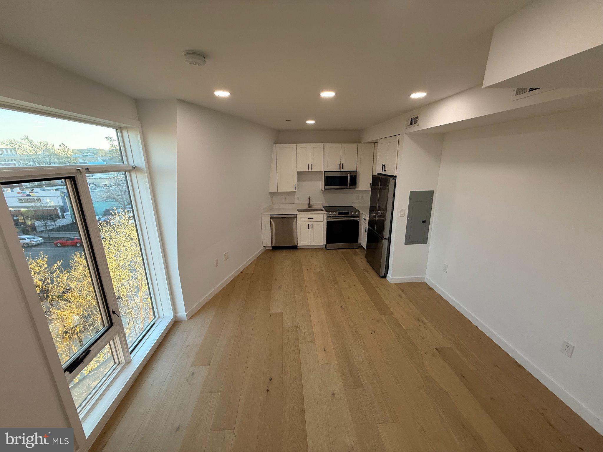 3601 14th Street Northwest, Unit 9 Washington, DC 20010 - Photo 23 of 34 Modern kitchen in bright, airy space.