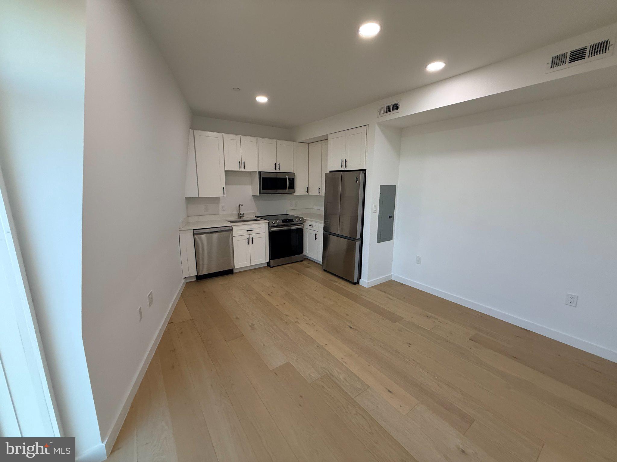 3601 14th Street Northwest, Unit 9 Washington, DC 20010 - Photo 24 of 34 Modern kitchen with sleek finishes.
