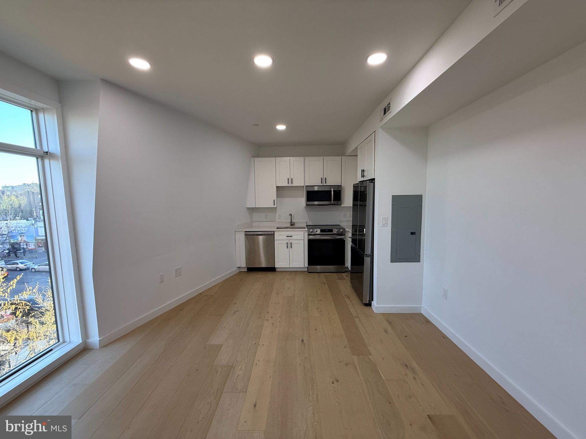 3601 14th Street Northwest, Unit 9 Washington, DC 20010 - Photo 4 of 34 Modern kitchen with natural light.