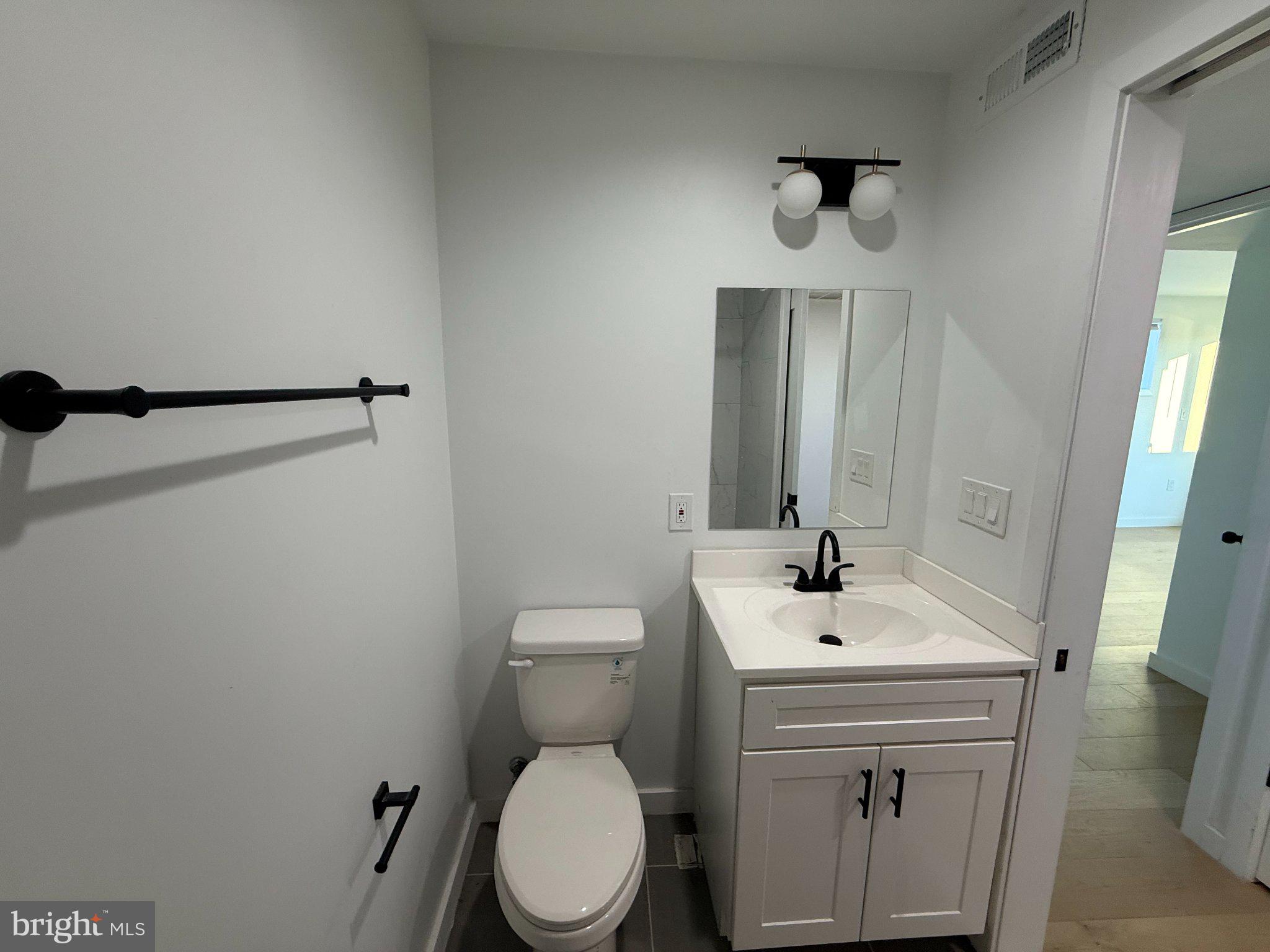 3601 14th Street Northwest, Unit 9 Washington, DC 20010 - Photo 9 of 34 Sleek and modern bathroom design.