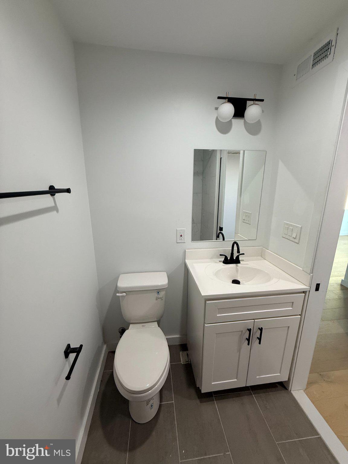 3601 14th Street Northwest, Unit 9 Washington, DC 20010 - Photo 10 of 34 Sleek and modern bathroom design.